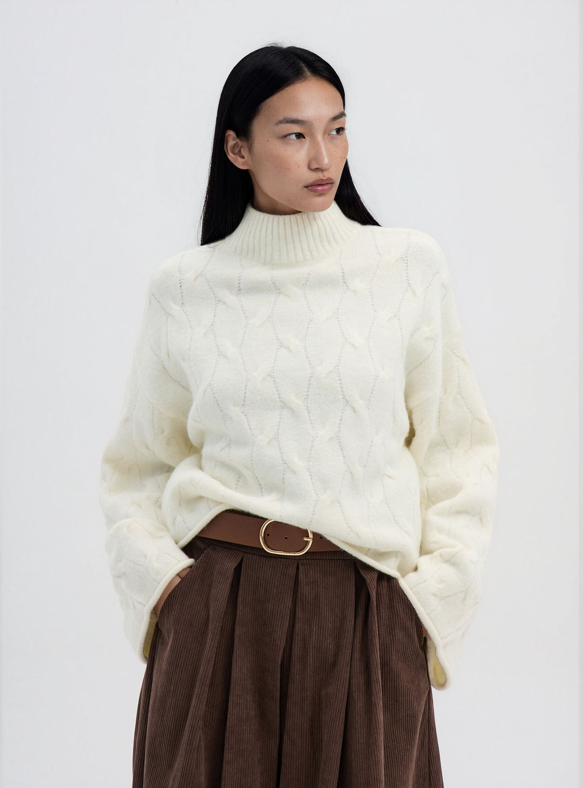 Jersey de punto trenzado con cuello alto