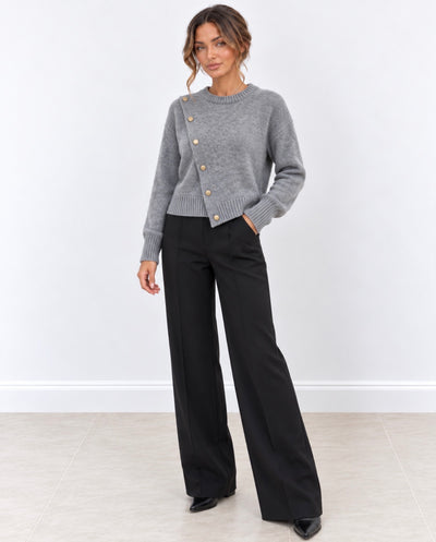 Jersey gris de punto con botones laterales