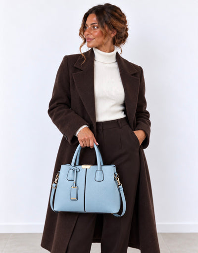 Bolso de Mano Azul Cielo con Detalles Dorados