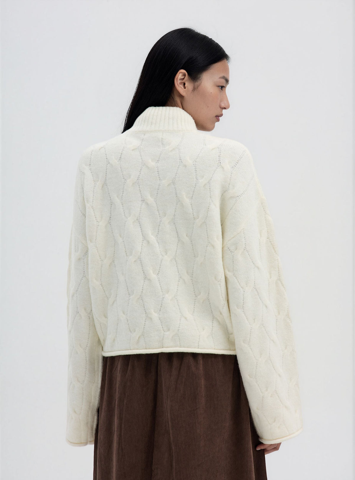 Jersey de punto trenzado con cuello alto